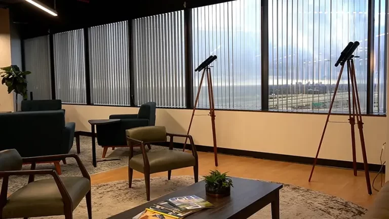 A beautiful panoramic view of downtown San Antonio Texas from the Venture X Coworking Space Lobby with modern office furniture with free covered parking